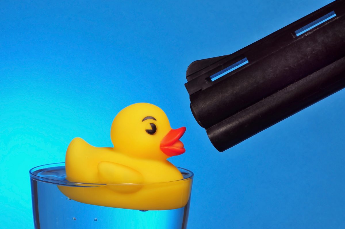 Bikie Arrested Over Festival Duck Shooting Game